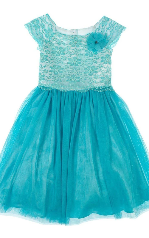 Robe en jersey trapèze à manches courtes, ornée de fleurs et de plis