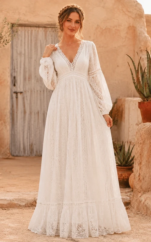 Vestido de novia bohemio de manga larga, color marfil, con escote en V y encaje, corte en A.