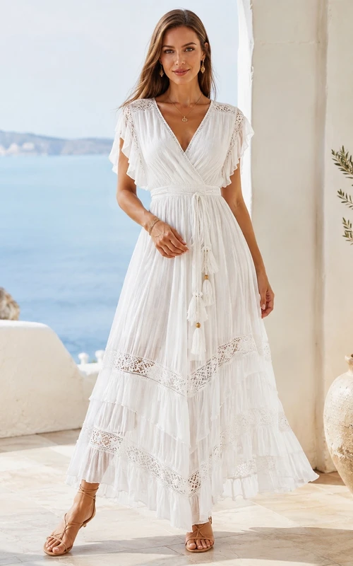 Vestido bohemio blanco de encaje con escote en V, manga corta y largo hasta los tobillos