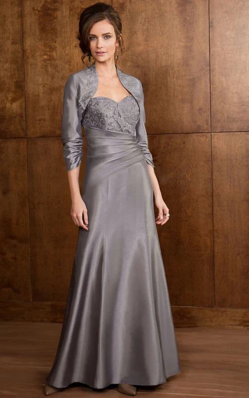 Vestido largo de manga 3-4 para la madre de la novia con chaqueta a juego y apliques.