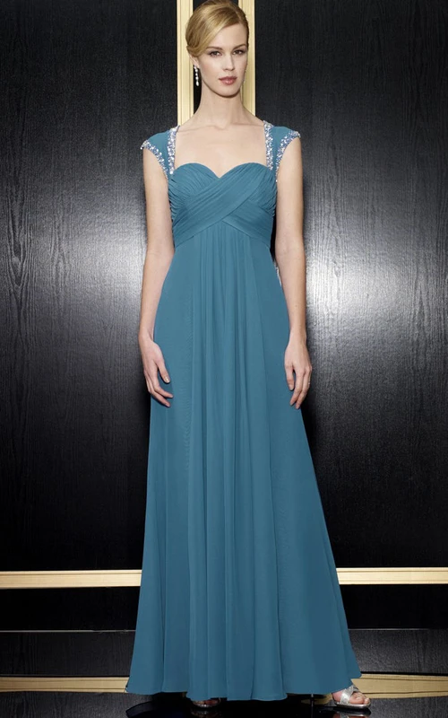 A-Linien-Kleid in Empire-Queen-Anne-Optik mit überkreuzten Trägern, Reißverschluss hinten und Perlenstickerei.