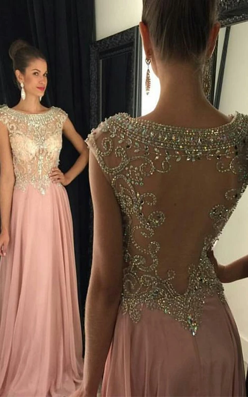 Robe de soirée époustouflante à col rond, perles et cristaux, sans manches, longue en mousseline de soie.