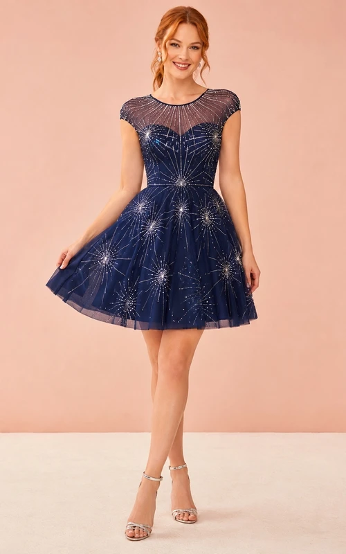 Robe cocktail mini trapèze à manches courtes et col rond, ornée de cristaux bleu marine, pour une allure plus sophistiquée.