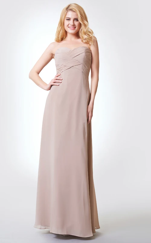 Robe longue sans manches en mousseline de soie trapèze avec bandage et drapé