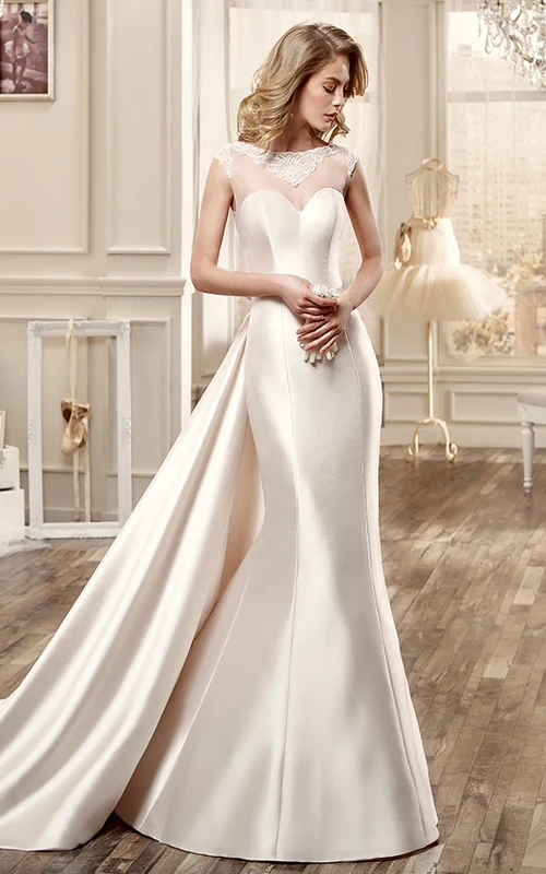 Brautkleid aus Satin mit herzförmigem Ausschnitt, kurzen Ärmeln, großer Schleife am Rücken und raffiniertem Rückenausschnitt