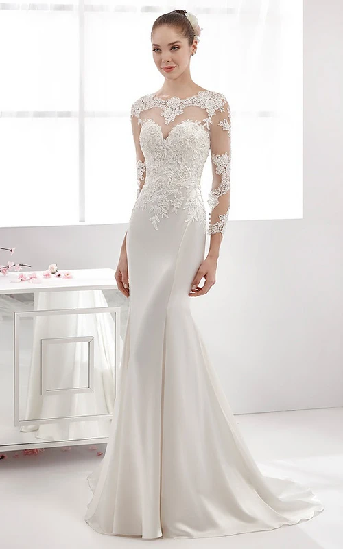 Elegante vestido de novia de satén de manga larga con corpiño con apliques de encaje y escote festoneado.