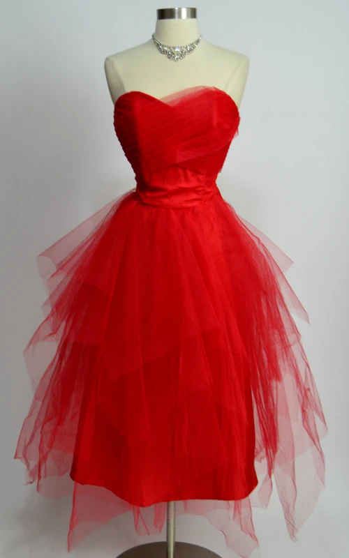 Robe en tulle mi-longue à décolleté en A et à volants