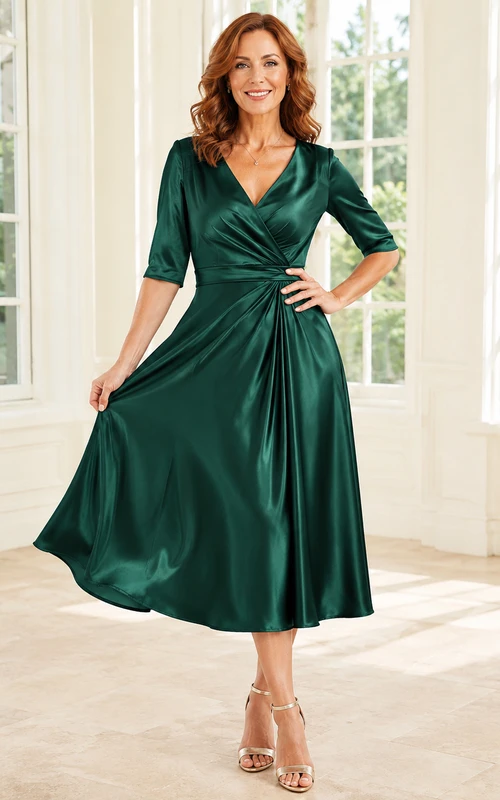 Robe trapèze vert émeraude pour femme mûre, en satin, manches courtes et cache-cœur, longueur thé.