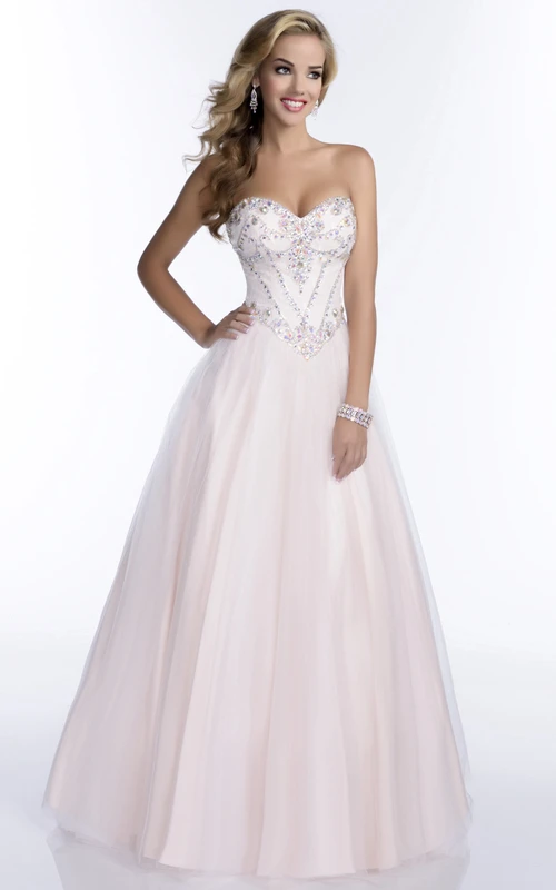 Robe de bal trapèze en tulle à décolleté cœur, corsage perlé et taille asymétrique