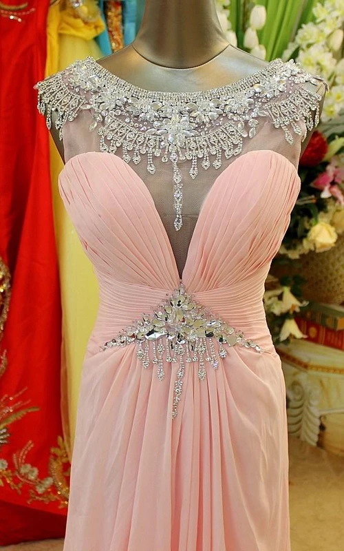 Precioso vestido de noche largo de gasa con abalorios de cristal rosa