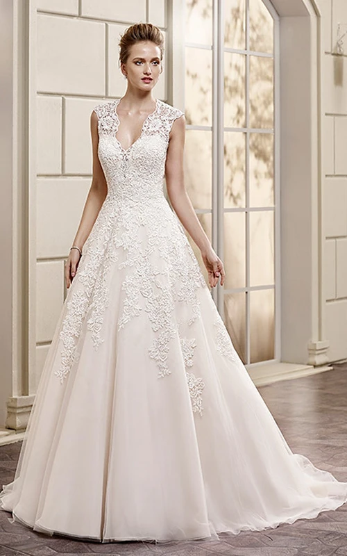 Robe de mariée longue trapèze en dentelle à manches courtes et col en V orné d'appliqués