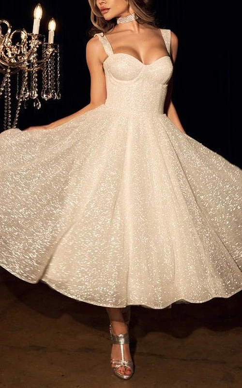 Robe de bal blanche scintillante à bretelles