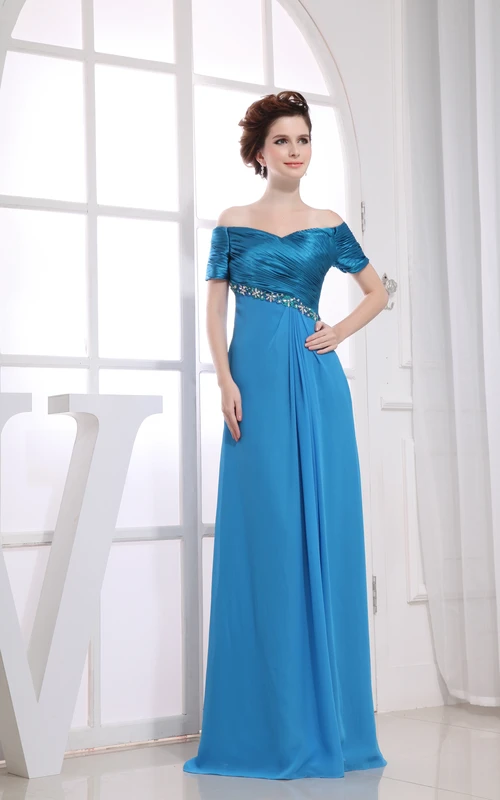 Robe longue raffinée avec fronces et perles