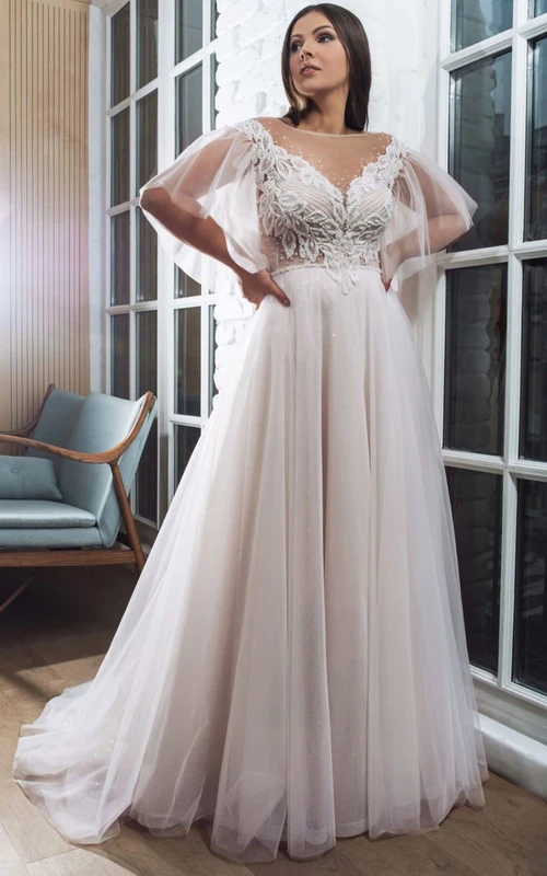 Robe de mariée élégante en tulle illusion, manches pétales, coupe trapèze, grande taille, dentelle et haut orné de perles