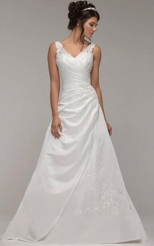 Robe de mariée en satin stretch sans manches, longue jusqu'au sol, avec décolleté en V et drapé sur le côté, ornée d'appliqués