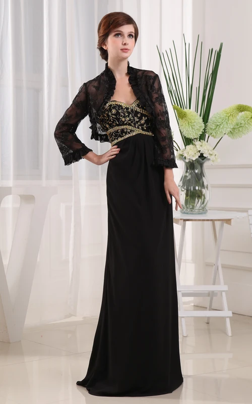 Elegante vestido largo ajustado con apliques y abalorios.