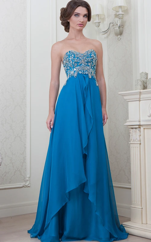 Robe de soirée longue en mousseline de soie, sans manches, à décolleté en cœur et drapée, coupe trapèze, ornée de perles