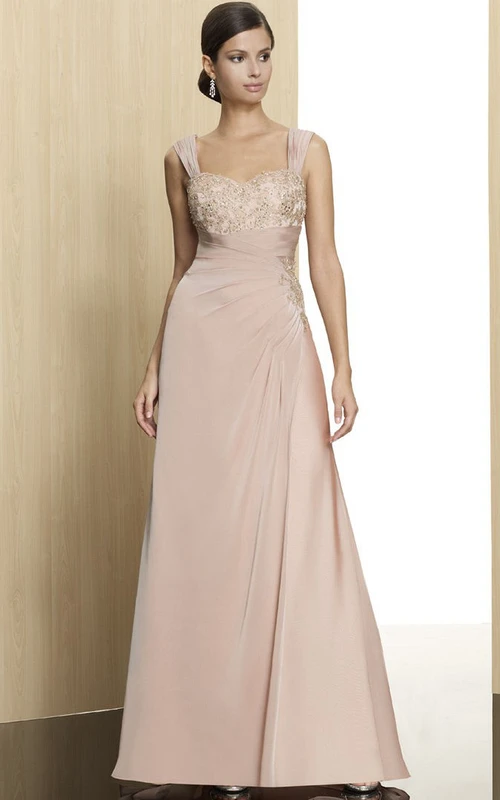 Robe de soirée sans manches en jersey à bretelles et applications, avec drapé