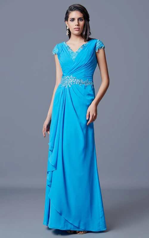 Vestido largo clásico de gasa con escote en V y espalda baja en V.