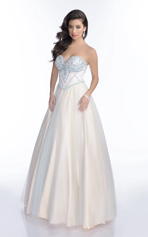 Robe de bal en tulle coupe trapèze, décolleté cœur, dos lacé et buste orné de bijoux