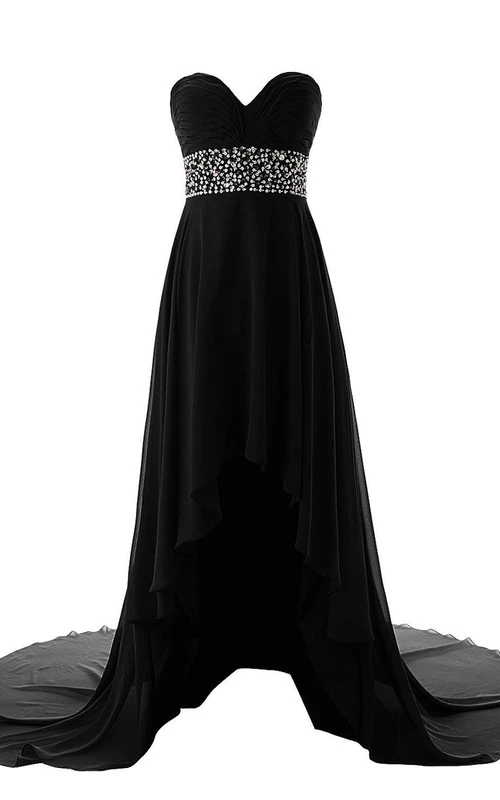 Robe en mousseline asymétrique à décolleté en cœur style empire, ornée de sequins