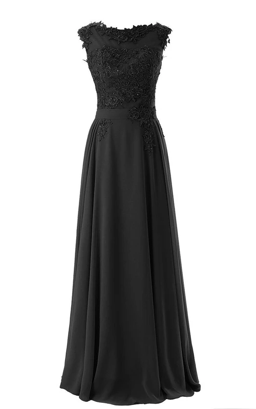 Vestido largo de gasa con mangas cortas y corpiño de encaje.