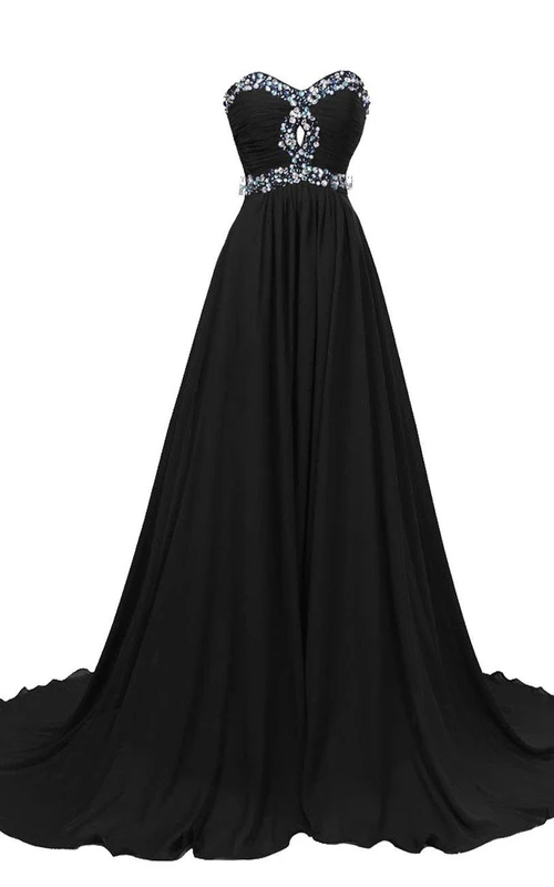 Robe en mousseline de soie à décolleté en A et ourlet en forme de cœur, ornée de strass.