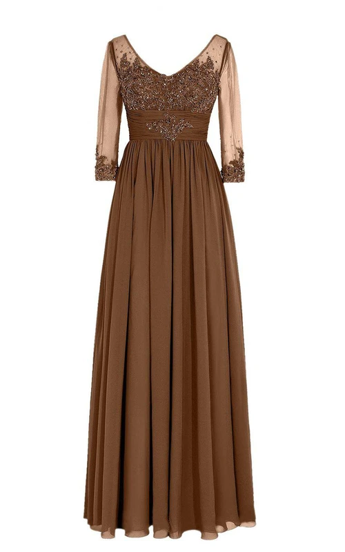 Vestido de gasa con escote en V y mangas de 3-4 mangas con efecto ilusión.