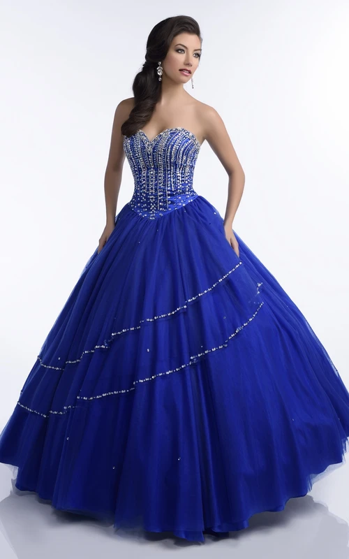 Robe de quinceañera en tulle à corset pailleté et décolleté cœur, ornée de détails brillants irréguliers