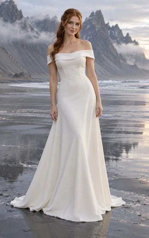 Sencillo vestido de novia de crepé con escote Bardot, corte en A, banda doblada y espalda abotonada.