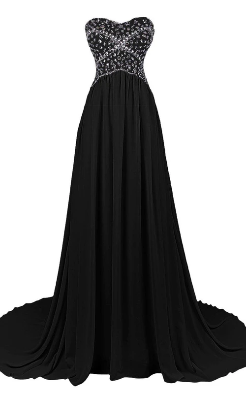 Vestido de gasa con escote corazón y corpiño de pedrería
