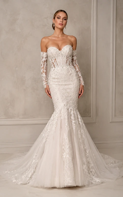 Robe de mariée sirène en dentelle, décolleté cœur, manches amovibles, traîne chapelle, applications florales, idéale pour une salle de bal.