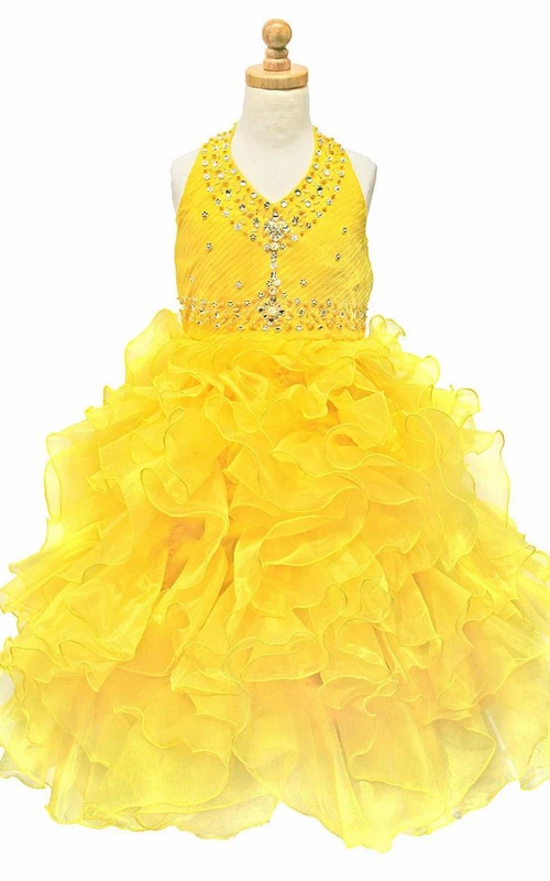 Vestido de niña de flores de largo midi con volantes, lentejuelas y organza, con cuentas naturales y capas.