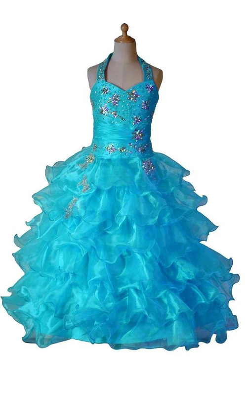 Robe dos nu en organza à volants et perles, audacieuse et élégante