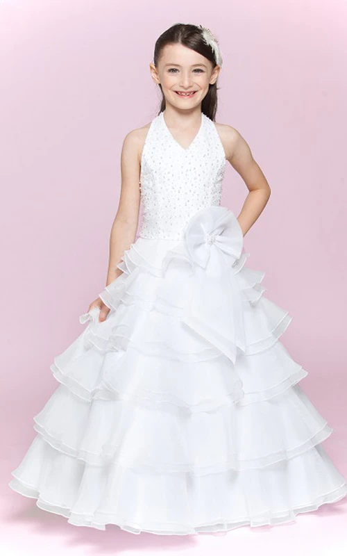 Vestido largo de organza con cuello halter y corte en A para niña de las flores, con detalle floral en la cintura.