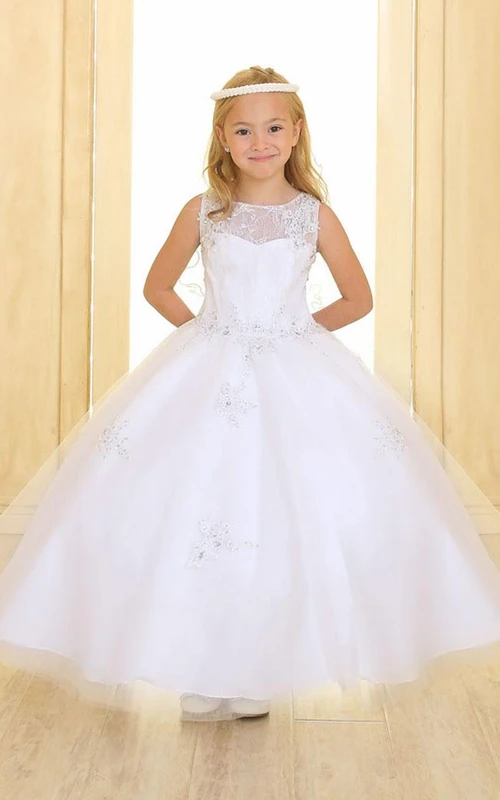 Vestido de niña de flores con volantes de tul y encaje con cuentas y efecto ilusión.