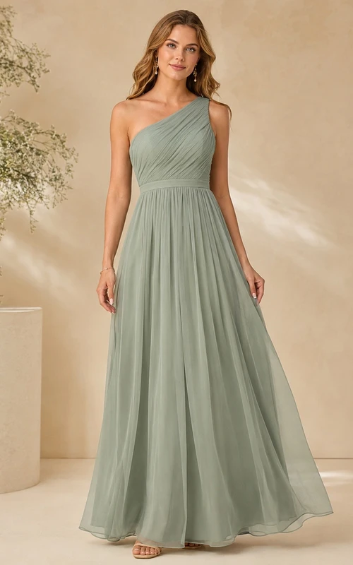 Vestido largo de gasa verde salvia, sin mangas, de corte A y con un solo hombro.