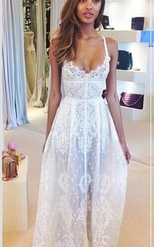 Elegante vestido de fiesta sin mangas con tirantes finos y encaje, largo hasta el suelo.