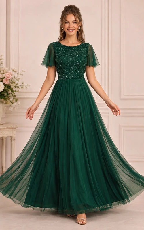 Vestido de gala formal de tul con lentejuelas y mangas cortas en color verde esmeralda