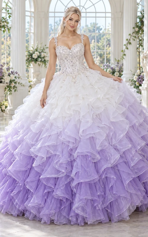 Vestido de novia de gala lila degradado con escote corazón, tirantes finos, corpiño bordado con cuentas y volantes de organza.