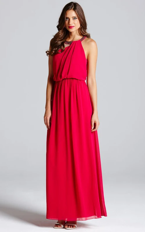 Vestido largo con escote en forma de ojo de cerradura y corpiño drapeado.