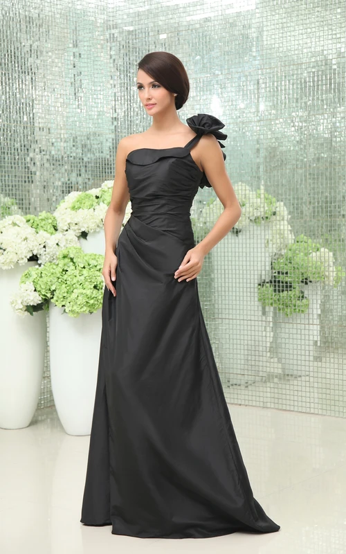 Robe trapèze asymétrique en taffetas, ornée d'un détail floral à l'épaule.