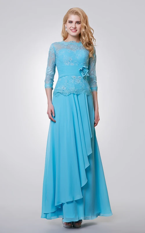 Robe longue en mousseline et dentelle à manches 3-4 et drapé sur le côté