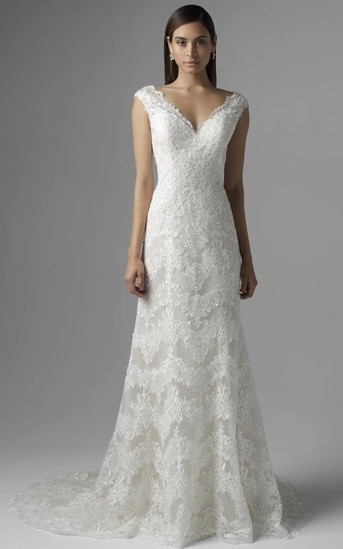 Vestido de novia de encaje sin mangas con escote en V profundo en la espalda.