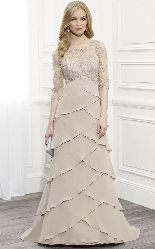 Vestido formal de gasa largo hasta el suelo con escote redondo y mangas cortas escalonadas.
