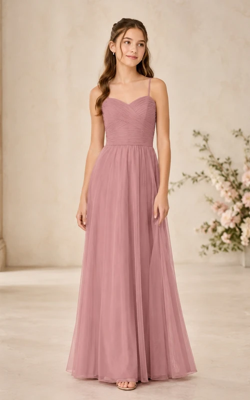 Vestido de dama de honor juvenil color rosa empolvado, corte en A, sin mangas, de malla elegante.