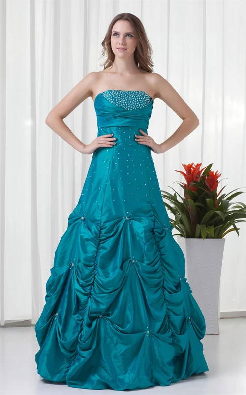 Robe bustier à fronces perlées et boucle
