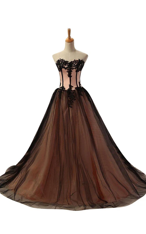 Vestido de gala bicolor de encaje y tul con espalda de cordones