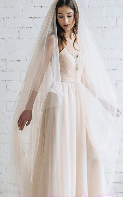Voile de mariée long et vaporeux couleur champagne
