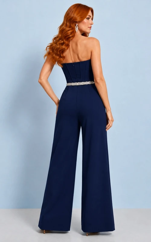 Marineblauer, taillierter Jumpsuit für festliche Anlässe mit trägerlosem Korsett-Oberteil, weitem Bein, Kristallgürtel und bodenlanger Passform